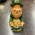Lucky Leprechaun leaning over Crock of Gold